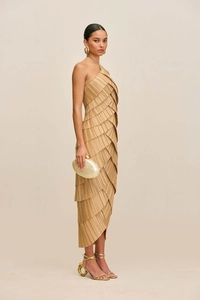 Detail of khaki tiered pleated design and layered texture on a sleeveless halter dress