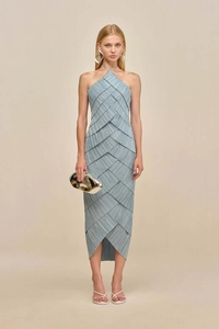Detailed view of fine pleated fabric and layered texture on light blue halter neck dress