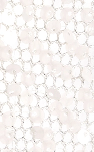 Macro view of white mesh fabric with translucent sequins for evening gown details