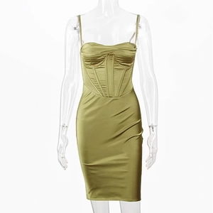 Detail of olive green satin corset dress with cowl neck and elegant ruching texture