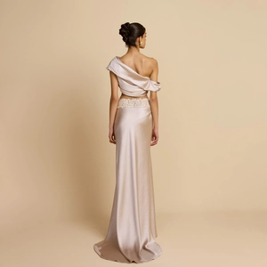 Elegant two-piece champagne satin gown featuring an asymmetrical shoulder and lace details