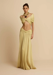 Detail view of two-piece beach dress set featuring a wrap crop top and draped long skirt