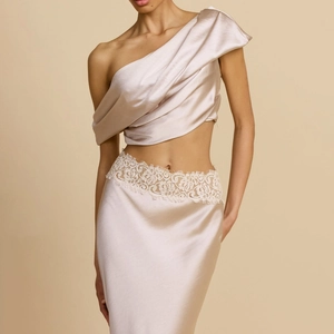 Elegant two-piece satin evening dress with asymmetrical shoulder top and lace waist detail