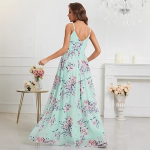 Mint green floral maxi dress with spaghetti straps and open back for summer vacations