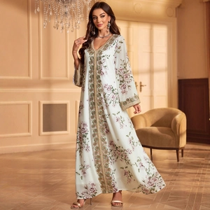Elegant white V-neck floral kaftan maxi dress with delicate embroidery and long sleeves