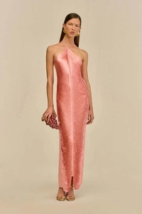 Detail of coral pink halter dress featuring layered fringes and elegant back slit