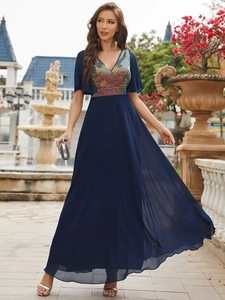 Detail of V-neck evening gown with gradient sequins and elegant butterfly sleeves