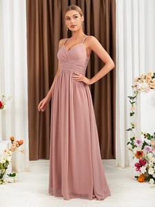 Detail of elegant V-neck pleated bodice on dusty pink long evening dress for formal events