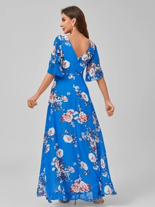 Close-up of blue floral print dress featuring deep V-back design and soft chiffon fabric