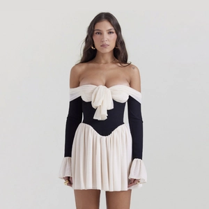 Elegant off-shoulder backless dress with black and white contrast pleats and bow