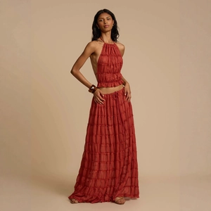 Chic two-piece halter top and pleated maxi skirt set in rust red for women