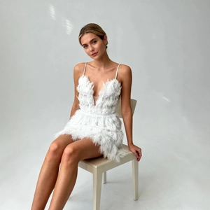 Sexy white deep V-neck mini dress with elegant feather details and slender spaghetti straps