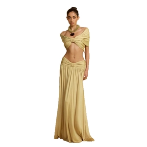 Two-piece beach vacation set with off-shoulder pleated crop top and matching maxi skirt
