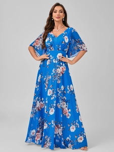 Detailed view of the blue floral maxi dress featuring a V-neckline and ruffle sleeves