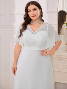 Detail of V-neck light blue plus size evening gown with delicate white floral lace embroidery