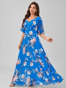 Close-up of V-neck floral maxi dress with flutter sleeves and high waist design details