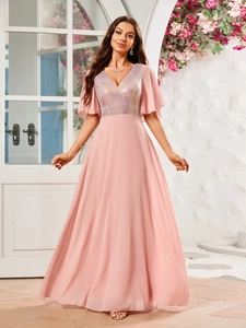 Detail of sequin V-neckline and flutter sleeves on this elegant dusty pink evening gown
