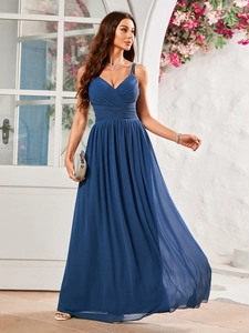 Detailed view of the dark blue chiffon evening dress featuring pleated bodice and V-neckline