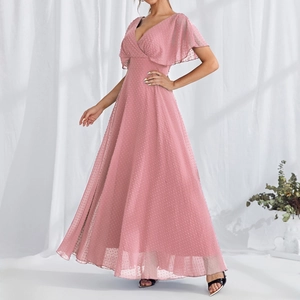 Elegant pink Swiss dot V-neck evening gown with ruffle sleeves and flowing long skirt