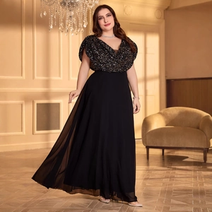 Detail of elegant V-neck plus size evening dress with black sequins and cape sleeves