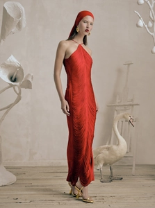 Elegant red halter neck fringe maxi dress with open back and tassel details for parties