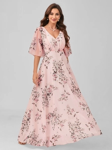 Detail of pink floral print V-neck maxi dress with butterfly sleeves and high waist cut