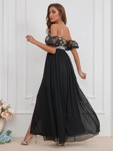Detail of sequin floral lace bodice with sparkling rhinestone belt and slit chiffon skirt