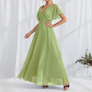 Close-up of avocado green V-neck dress with 3D polka dots and ruffled sleeves details