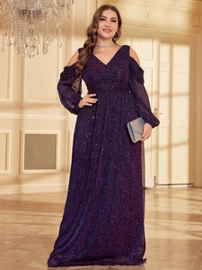 Close-up of elegant V-neck and cold shoulder details on a shimmering purple evening gown