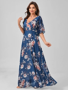 Detail of elegant V-neck floral maxi dress with ruffle sleeves and high waist design