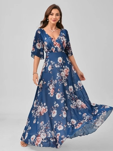 Detailed full-length view of blue V-neck floral maxi dress with elegant chiffon drape