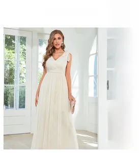 Detail of elegant white lace V-neckline with delicate embroidery on summer evening dress