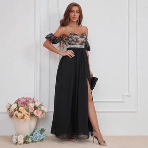 Elegant black evening gown with sequin embroidery, puffy sleeves and high slit