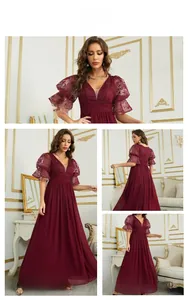 Detail of burgundy evening gown with lace puff sleeves and deep V-neckline texture