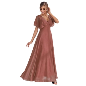 Elegant V-neck pink swiss dot evening dress with ruffle sleeves and high waist maxi skirt