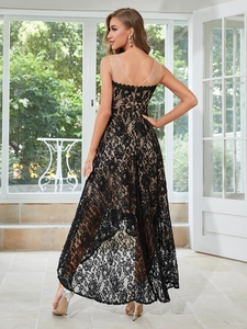 Detail of elegant black floral lace evening dress showing back zipper and mesh neckline