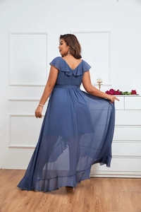 Detail of dusty blue chiffon plus size dress showing elegant ruffled V-back and high-low hem