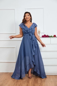 Detail of the ruffle V-neck and self-tie waist on this elegant blue chiffon evening dress