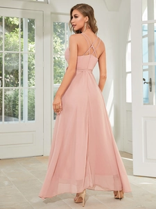 Detailed back view of dusty pink evening gown with elegant criss-cross back straps