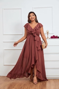 Detail of elegant dusty rose chiffon dress with ruffled sleeves and high-low hemline