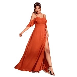 Elegant rust orange sleeveless evening gown with spaghetti straps and high slit detail