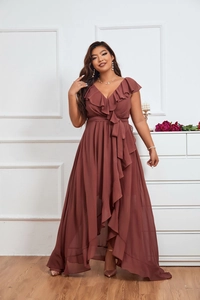 Detail of elegant V-neck chiffon evening gown with layered ruffles and high-low hemline
