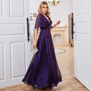 Detail of elegant deep purple sequined evening gown featuring ruffled short sleeves and V-neck
