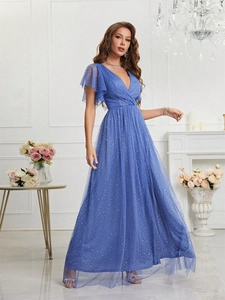 Detail of blue evening dress featuring sequined mesh fabric and ruffle sleeves