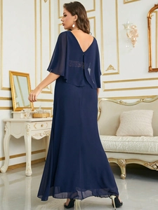 Elegant navy blue V-neck slim fit maxi dress with sheer cape sleeves and open back design