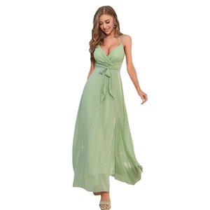 Elegant sage green long dress with thin straps and deep V-neckline for summer events