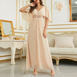 Detail view of champagne chiffon maxi dress with sequined V-neck and butterfly sleeves