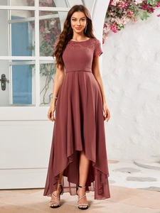 Detail of high-low chiffon evening dress with floral lace sleeves in dusty rose pink color