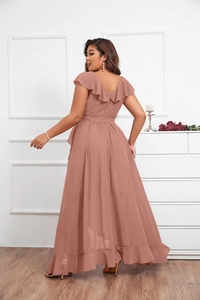 Detail view of the deep V-back and elegant ruffle layers on a dusty rose chiffon maxi dress