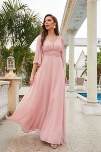 Detailed full view of pink chiffon V-neck gown with pleated flare sleeves and A-line floor length